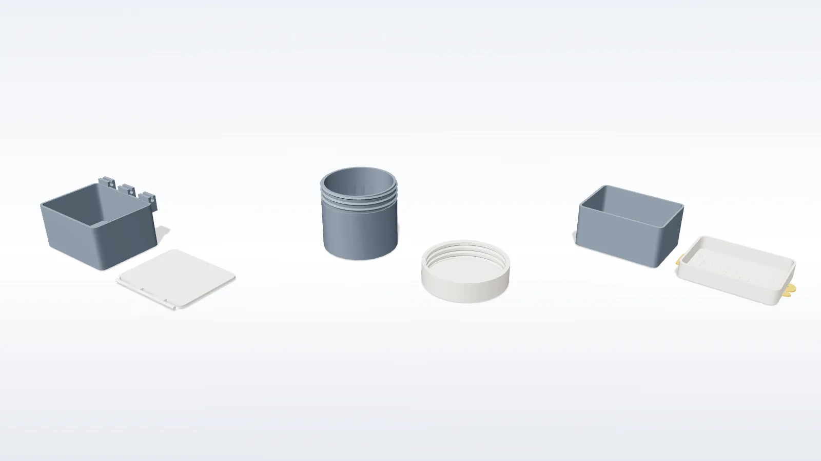 Three generated boxes: a hinged rectangular box, a cylindrical screw-top jar, and a slide-lid box with inlaid text