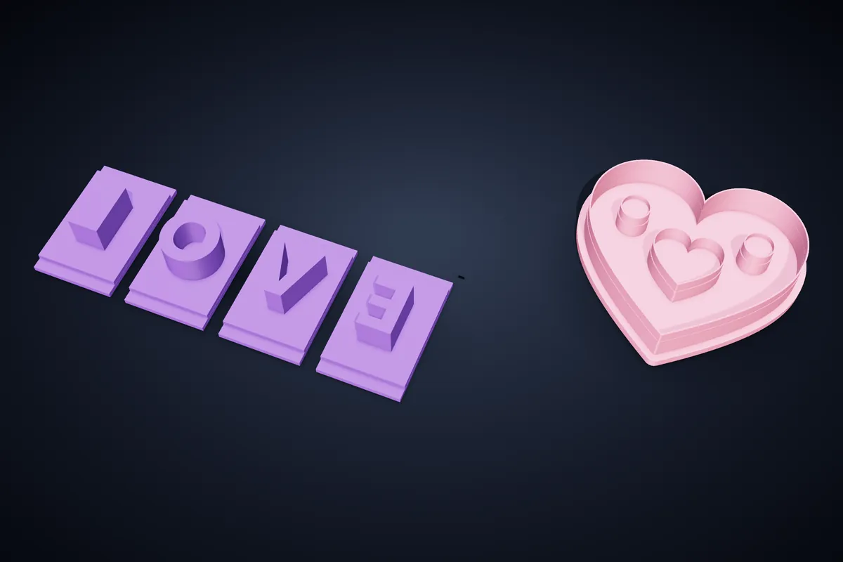 拼出 LOVE 的字母印章,以及一個在切割時同時壓出圖樣的愛心餅乾模具