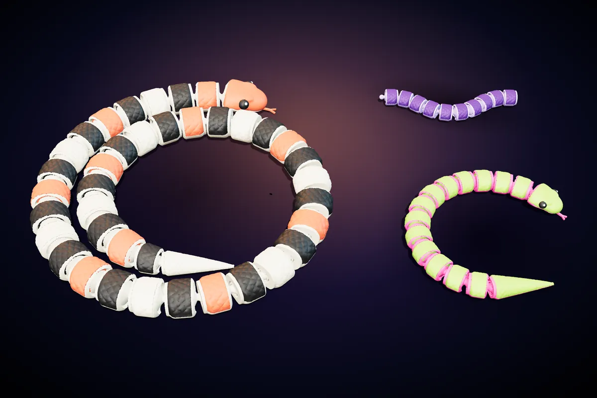 A one-metre endless snake curled into a banded spiral, a neon snake and a pack of extra segments